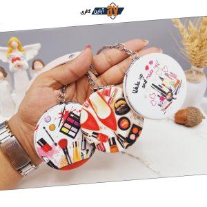 آینه آرایشی دسته دار مدل دایره ای طرح لوازم آرایشی