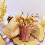 رژ لب مایع طرح انگشتر برند AMERICOLOR کد YL2234