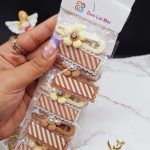 پک 10 عددی پنس و گیره مو نود طرح گل خندان