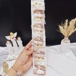 پک 10 عددی پنس و گیره مو نود طرح گل خندان
