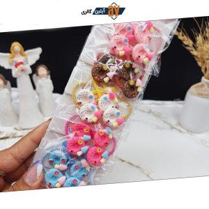 پک 10 عددی گیره و کش مو طرح دونات