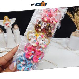 پک 10 عددی گیره و کش مو طرح دونات