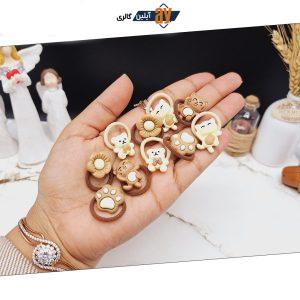 پک کش مو 10 عددی رنگ نود طرح گل و گربه کیوت