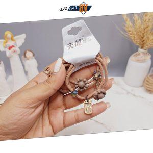 کش مو 2 تایی طرح گل و مروارید و اتیکت کد 0012 رندم