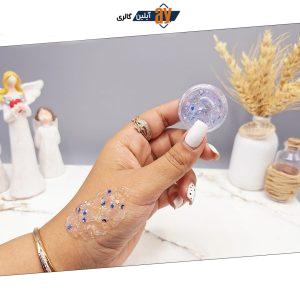 گلیتر مایع رنگ یاسی با ستاره آبی