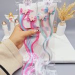 پنس موی دخترانه با موی اکستنشن رنگی طرح پاپیون و پروانه