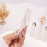 ست گوشواره و گردنبند طرح بالرین نقره ای استیل