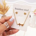 ست گوشواره و گردنبند طرح ضربان قلب طلایی استیل
