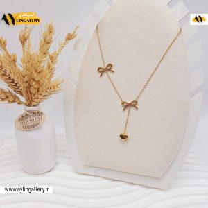 گردنبند طرح پاپیون و آویز دار قلب طلایی