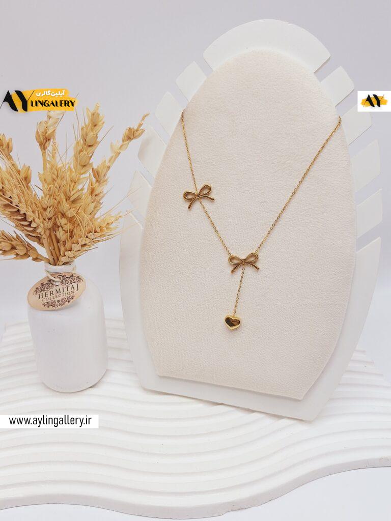 گردنبند طرح پاپیون و آویز دار قلب طلایی